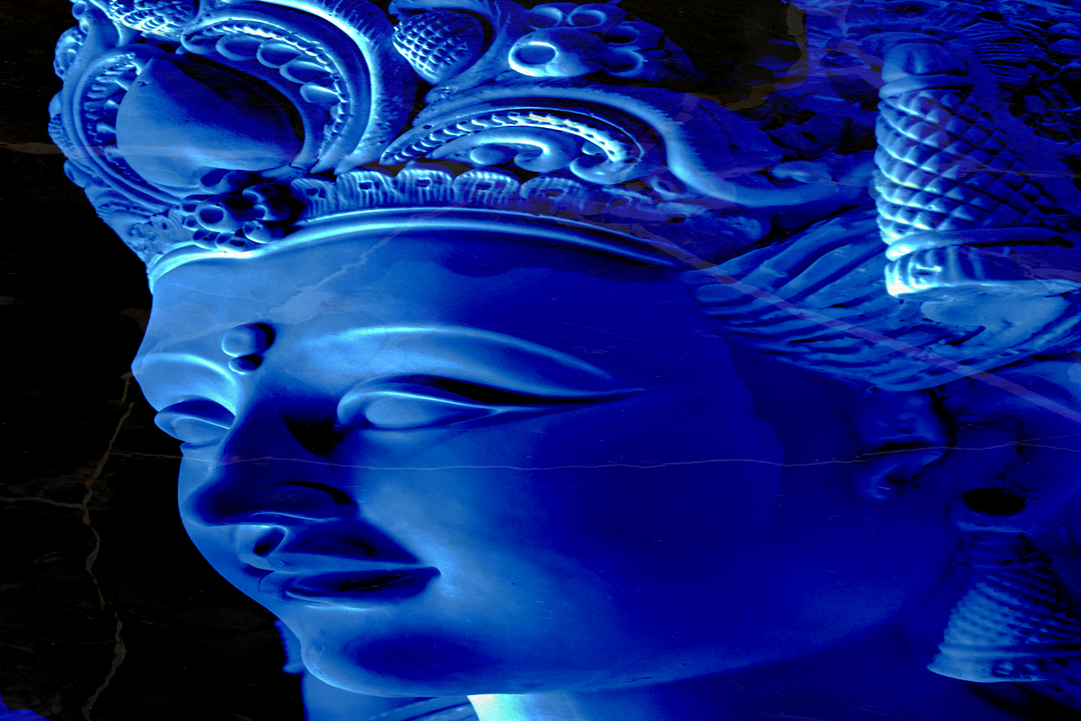 Blue statue with 'Barbelo' logo on a dark background